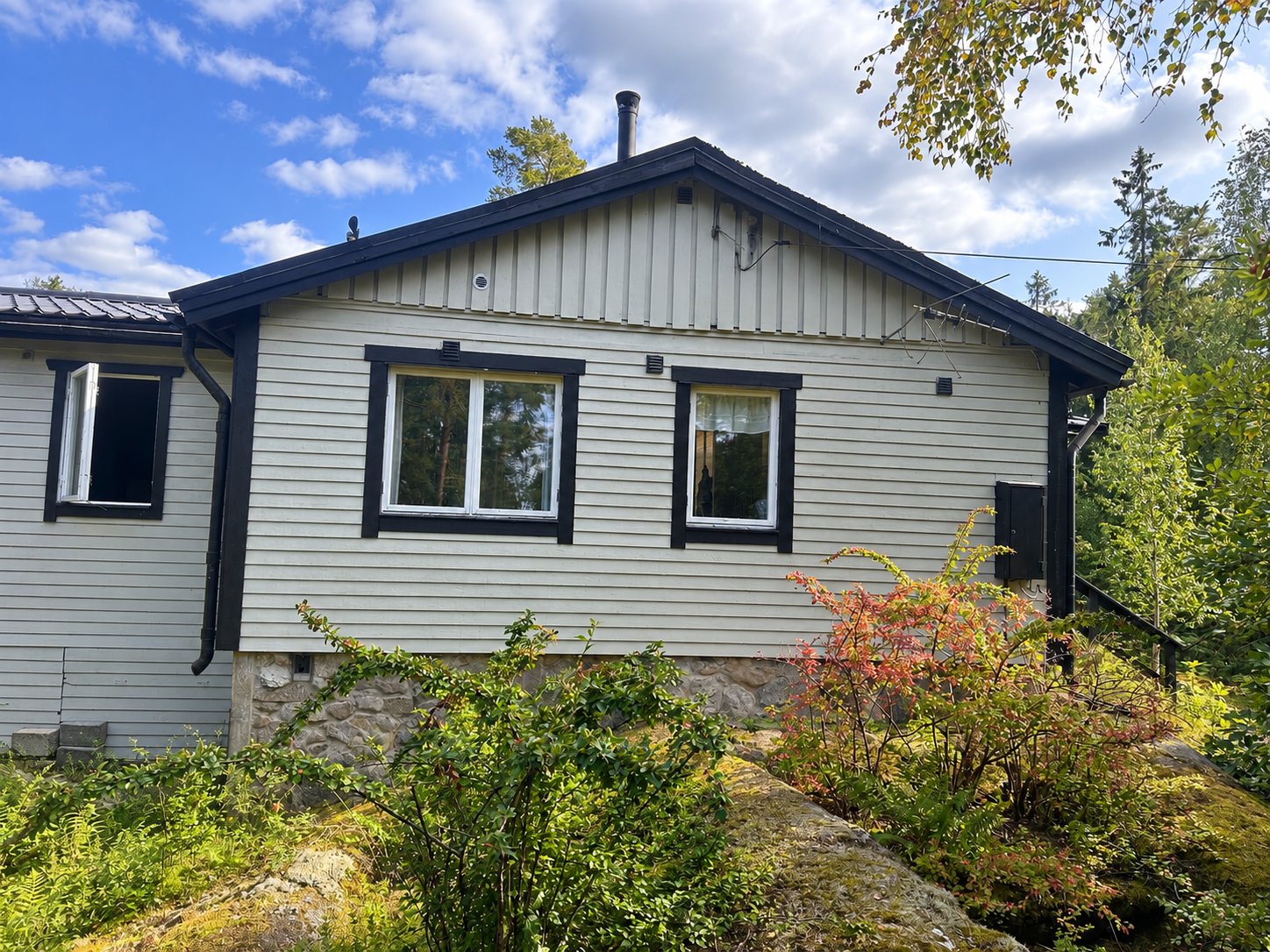 Nytt tak och fasad på fritidshus, Tynningö